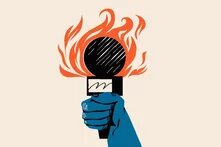 Eine Comic-Hand hält ein brennendes Presse-Mikrofon