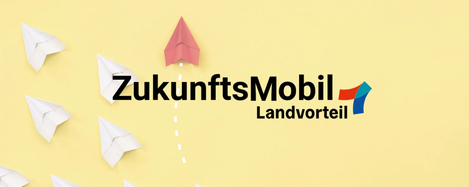 Logo von ZukunftsMobil. Im Hintergrund sind Papierflieger. 